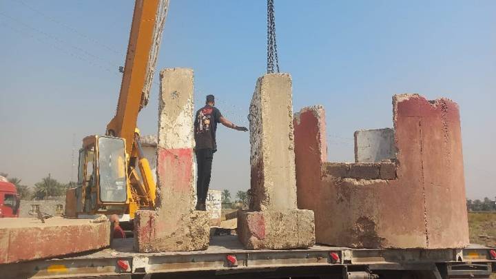 قيادة عمليات ترفع عددًا من الأبراج الكونكريتية المتروكة جنوبي بغداد